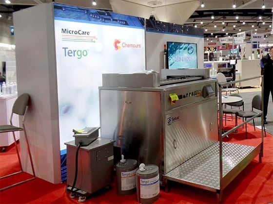 A large, fully-featured vapor degreaser was loaded with solvent and performing cleaning tests at the show.