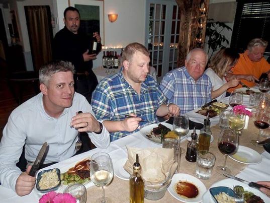 The newest member of the MicroCare team, Liam Taylor (left) enjoyed his dinner with Scott Wells and Chris Jones