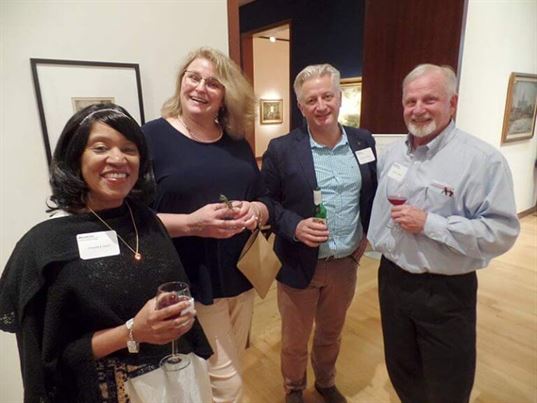 The dinner party is a great time for people from different departments and different regions to meet and mingle. Here, Johanna Grey, Elizabeth Norton, Steve Playdon and Carroll Smiley all chat