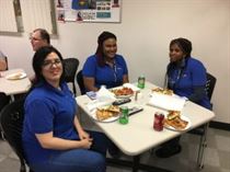 Migdalia, John, Erika and Nicole share time together at the party.